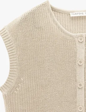 Chaleco de mujer de punto con botones en liso - Parfois - FashionsVida