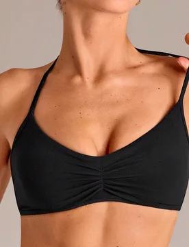 Sujetador deportivo FeatherFit™ con cuello de halter ajustable, espalda descubierta, frente fruncido y copas antideslizantes desmontables para uso e - Shein - FashionsVida