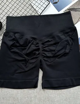 Shorts de yoga sin costuras de cintura alta para mujer - Elásticos, levanta glúteos, negros para deportes - Shein - FashionsVida