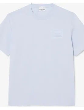Camiseta unisex de punto jersey unisex con detalles de la marca en relieve en azul de manga corta - Lacoste - FashionsVida