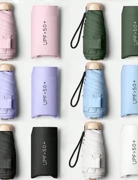 Pieza Paraguas de viaje mini, paraguas plegable, paraguas portátil para exteriores, paraguas de protección UV, con bolsa de almacenamiento, protecci - Shein - FashionsVida