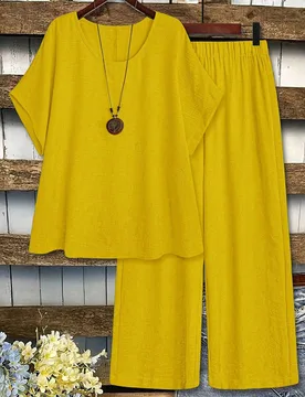 Conjunto casual de 2 piezas de mujer talla grande con top de cuello redondo y manga media en unicolor y pantalones de pierna ancha 4XL - Shein - FashionsVida