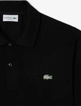 Polo de hombre de minipiqué classic fit con detalle bordado de manga corta - Lacoste - FashionsVida