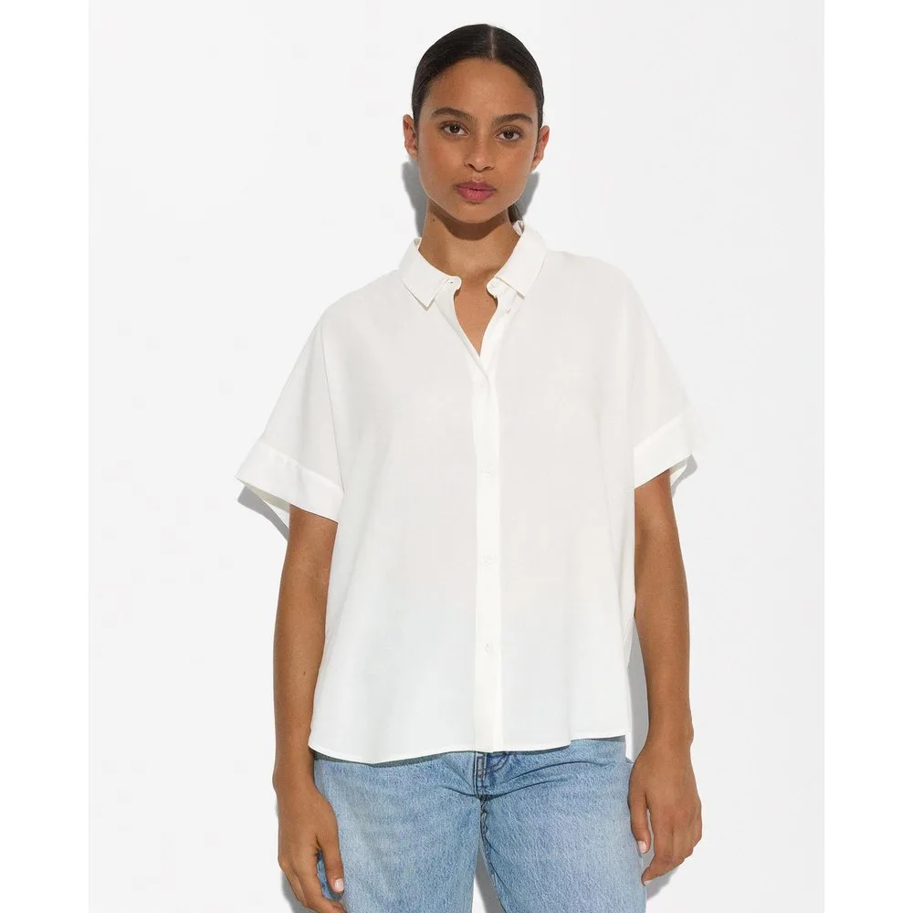 Camisa de mujer de manga corta en liso - Parfois - FashionsVida