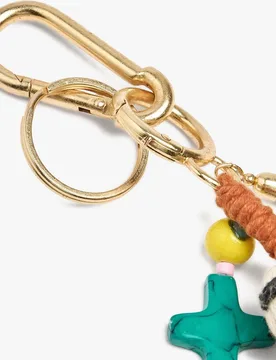 Llavero con charm de muñeco y flecos decorativos - Parfois - FashionsVida
