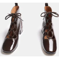 Botines de mujer de tacón y caña baja de piel acabado charol