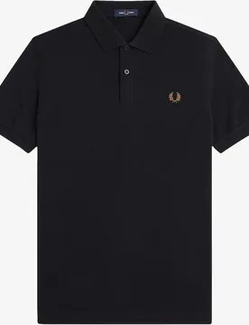 Polo de hombre liso de manga corta en piqué de algodón - Fred Perry - FashionsVida