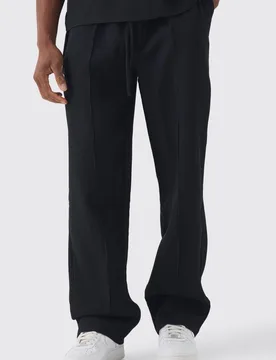 Herren Plissee-Hose mit elastischem Bund in entspannter Passform Black Größe Small - boohooMAN - FashionsVida