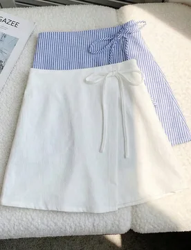 Ropa de otoño para niñas preadolescentes, falda pantalón con lazo de lunares beige leche, falda línea A de cintura alta con pantalones cortos inco - Shein - FashionsVida