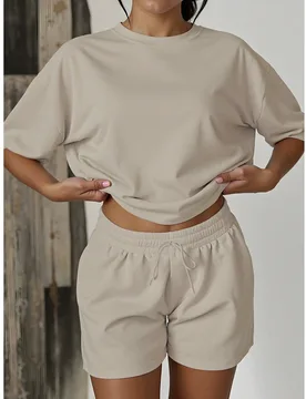 Conjunto de camiseta de cuello redondo y pantalones cortos de unicolor para mujer, estilo casual de verano y vacaciones, atuendo deportivo elegante pa - Shein - FashionsVida