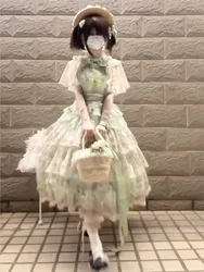 An elegant daily dress with a green country style shawl