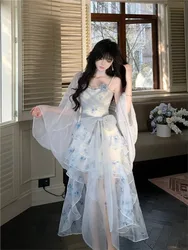 This is a dress with sense of atmosphere and style featuring blend printed straps irregular mesh