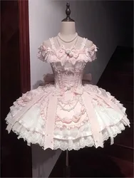 A cute and sweet pink ballet-style birthday dress with cinched waist long tail