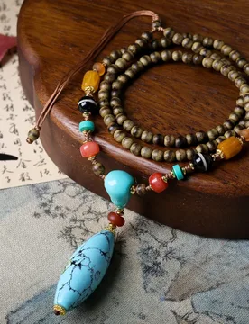 Hand-woven butter agarwood necklace with rhodochrosite, turquoise, and bead pendants in a new Chinese style sweater chain - Aliexpress - FashionsVida
