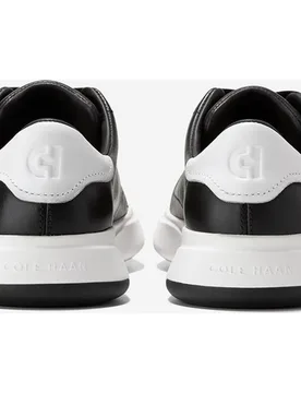 Zapatillas deportivas de mujer ligeras confeccionadas en piel - Cole Haan - FashionsVida