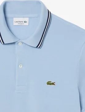 Polo de hombre de corte regular con ribetes decorativos de manga corta - Lacoste - FashionsVida