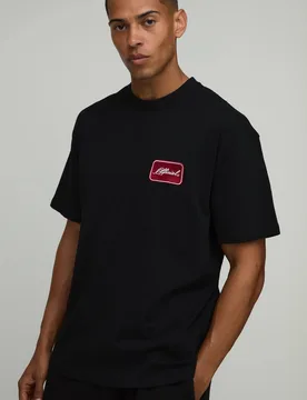 Herren Übergroßes Offizielles Besticktes T-Shirt Black Größe Medium - boohooMAN - FashionsVida