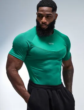 Herren Man Active Muscle Fit Panel T-shirt Green Größe XS - boohooMAN - FashionsVida