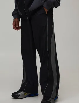 Herren Fallschirmhose mit elastischem Bund und Paspeldetail Black Größe Q - boohooMAN - FashionsVida
