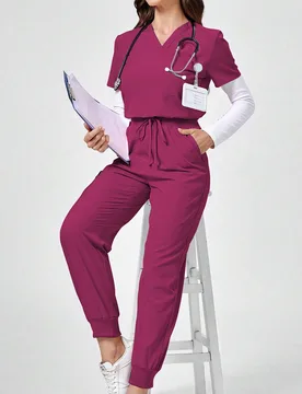 Conjunto de uniforme de scrubs de unicolor con top de cuello en V de manga corta y pantalones con cordón y bolsillo. Conjunto de ropa de scrubs, vest - Shein - FashionsVida