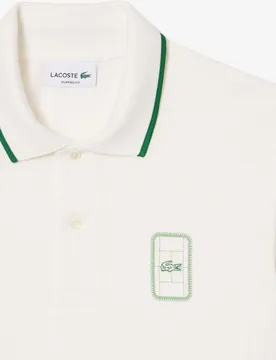 Polo de hombre de piqué estampado de corte clásico en verde de manga corta - Lacoste - FashionsVida