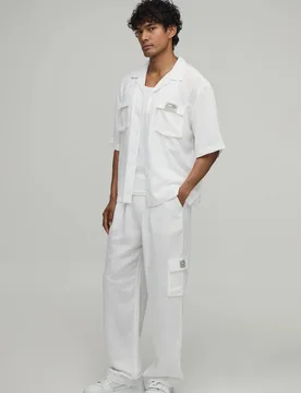 Herren Leinen Übergroßes Kurzarm Cargo Hemd & Weite Hosen Set White Größe XL - boohooMAN - FashionsVida