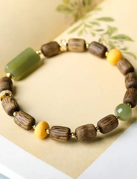 Chinese-style green Qinan barrel bead agarwood , natural Hetian jade and amber hand-beaded bracelet - Aliexpress - FashionsVida