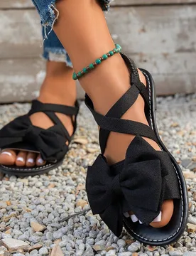 Sandalias planas con lazo bonito para mujer, sandalias elegantes de unicolor con punta abierta, diseño con correa cruzada en el tobillo, sandalias ca - Shein - FashionsVida