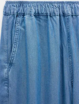 Vaqueros anchos de mujer 100% liocel con cintura elástica en liso - Parfois - FashionsVida