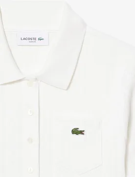 Polo de mujer de punto pointelle de corte ajustado en de manga corta - Lacoste - FashionsVida