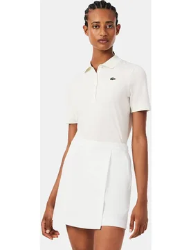 Polo de golf elástico de corte ajustado de hombre con protección UV - Lacoste - FashionsVida