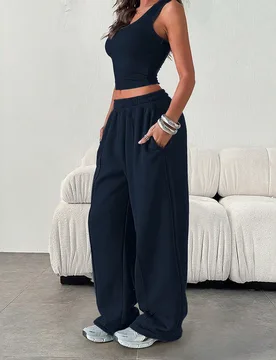 Pantalones de chándal sueltos y casuales de unicolor con cintura elástica y bolsillos para mujer, para invierno L - Shein - FashionsVida