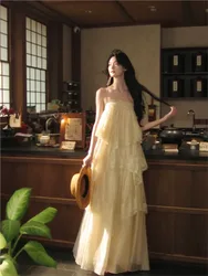 A soft and elegant cake dress with strappy lace hem