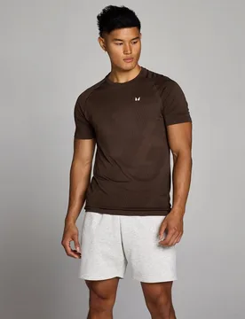 Camiseta sin costuras Tempo Pillar Graphic para hombre de MP - Chocolate - XS - MyProtein - FashionsVida