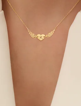 Pieza Nuevo collar de cadena de acero inoxidable con colgante de alas de ángel, pluma, letra y corazón dorado, estilo minimalista de moda, para muje - Shein - FashionsVida
