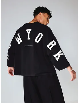 Camiseta de manga larga con cuello redondo y estampado gráfico de Nueva York de talla grande con estampado en las mangas M - Shein - FashionsVida