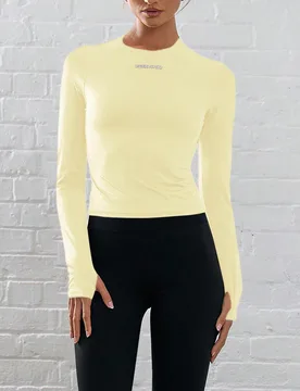 Top corto de manga larga con agujero para el pulgar, de material elástico, para actividades como pádel, tenis, pickleball o gimnasio, en color amari - Shein - FashionsVida