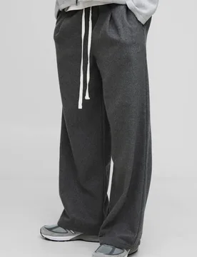 Herren Plissee-Hose mit elastischem Bund und weiten Beinen in Woll-Optik Charcoal Größe Medium - boohooMAN - FashionsVida