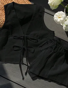 Conjunto informal de 2 piezas de top sin mangas con nudo y shorts de unicolor para mujer, verano S - Shein - FashionsVida
