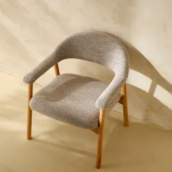 Butaca en tejido bouclé Hugge