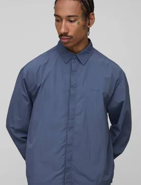 Herren Oversized Hemd mit verdeckter Knopfleiste und Crinkle-Struktur Slate Blue Größe XL - boohooMAN - FashionsVida