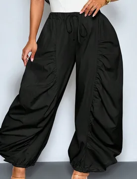 Pantalones casuales sueltos de unicolor con diseño plisado, bolsillos grandes, cintura elástica y ajuste de pierna ancha, adecuados para uso diario - Shein - FashionsVida