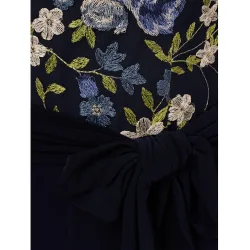 Mono de mujer con top floral y escote en pico