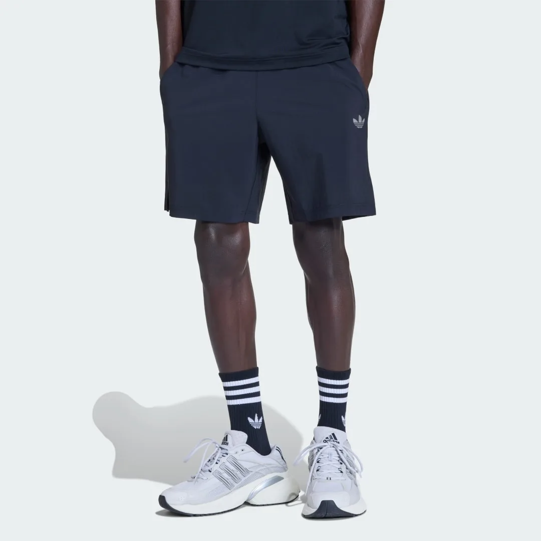 SHORT TECH TREFOIL ESSENTIALS POLIESTERE S Black - Adidas - FashionsVida