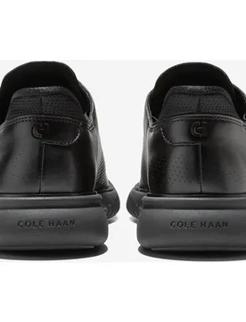 Zapatos de cordones de hombre confeccionados en piel perforada - Cole Haan - FashionsVida