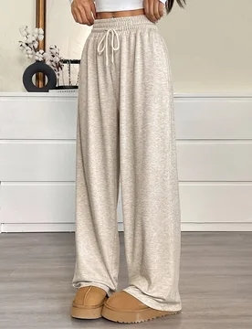 Pantalones de chándal de pierna ancha con cordón en la cintura de unicolor, suaves y cómodos, para mujer de talla grande, atuendos de otoño, playa - Shein - FashionsVida