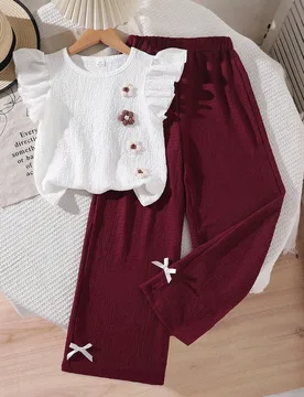 Set de 2 piezas de camiseta casual para niñas, conjunto de top con manga acampanada de textura de hilo colorido con lazo y pantalones de pierna ancha - Shein - FashionsVida