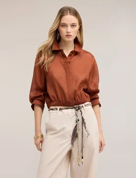Camisa de mujer corta en muselina de ramio abertura frontal con cuello clásico y cierre con botones bajo elástico - Motivi - FashionsVida