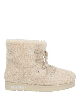 Botines de caña alta Mujer Beige 35,39 Mujer - Moschino - FashionsVida
