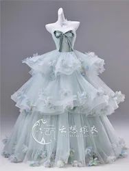 Strapless sleeveless blue three-dimensional flower-tied mid-length performance dress